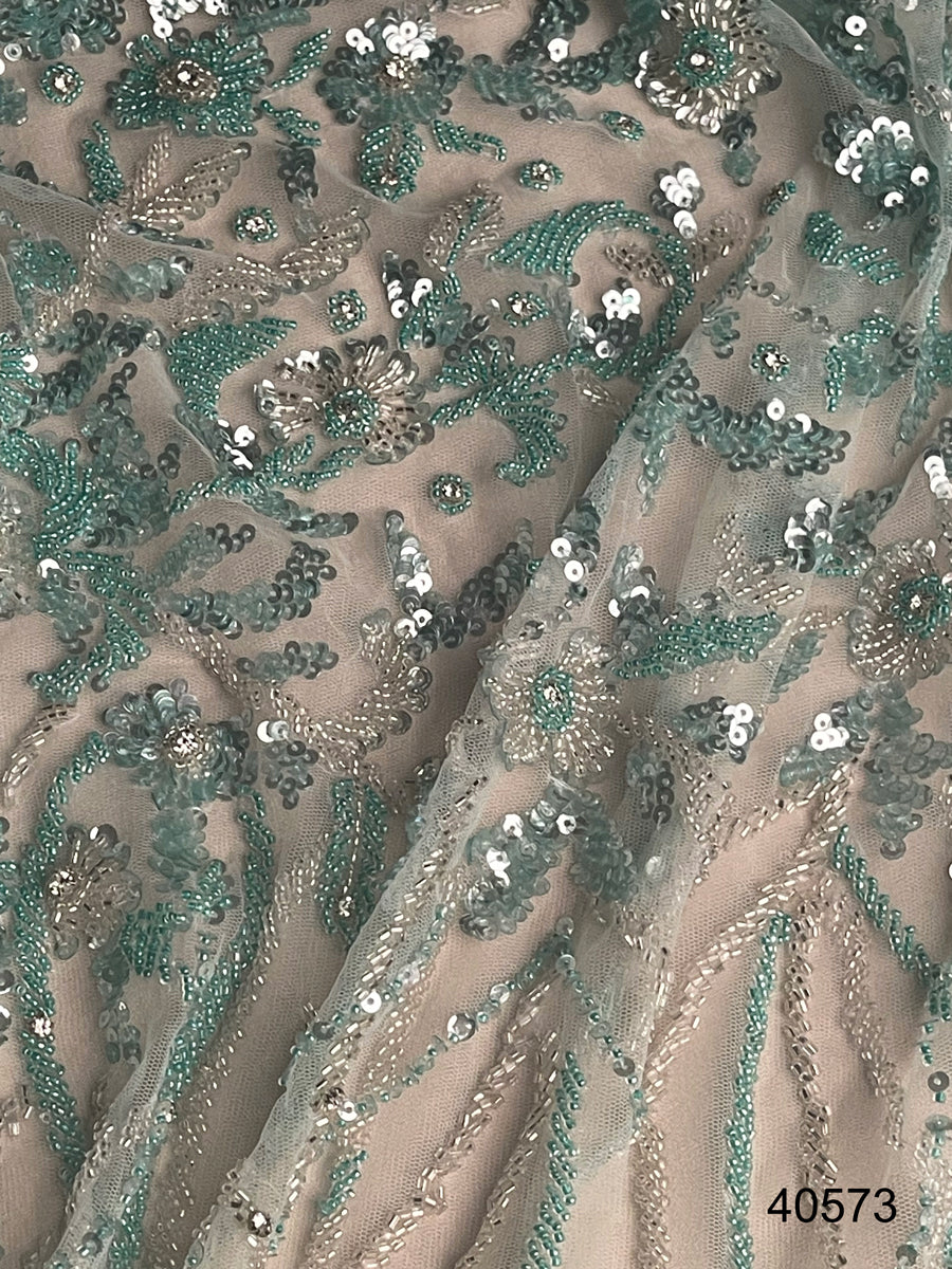 #40573 Glimmering Grace: Hand-Beaded Fabric Exuding Grace with Glowing Beads and Sequins