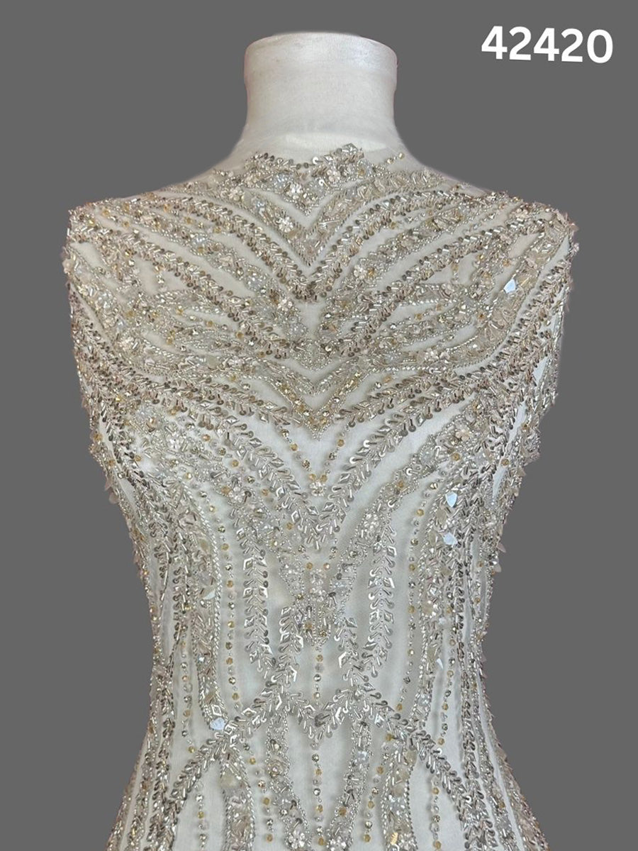 #42420 Elegant Hand-Beaded Silver Bridal Fabric with Asymmetric Design, Embellished with Sequins, Beads, and Rhinestones for a Glamorous Bridal Look